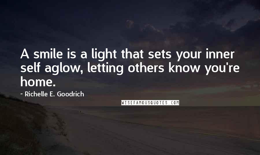 Richelle E. Goodrich Quotes: A smile is a light that sets your inner self aglow, letting others know you're home.