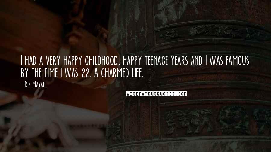 Rik Mayall Quotes: I had a very happy childhood, happy teenage years and I was famous by the time I was 22. A charmed life.