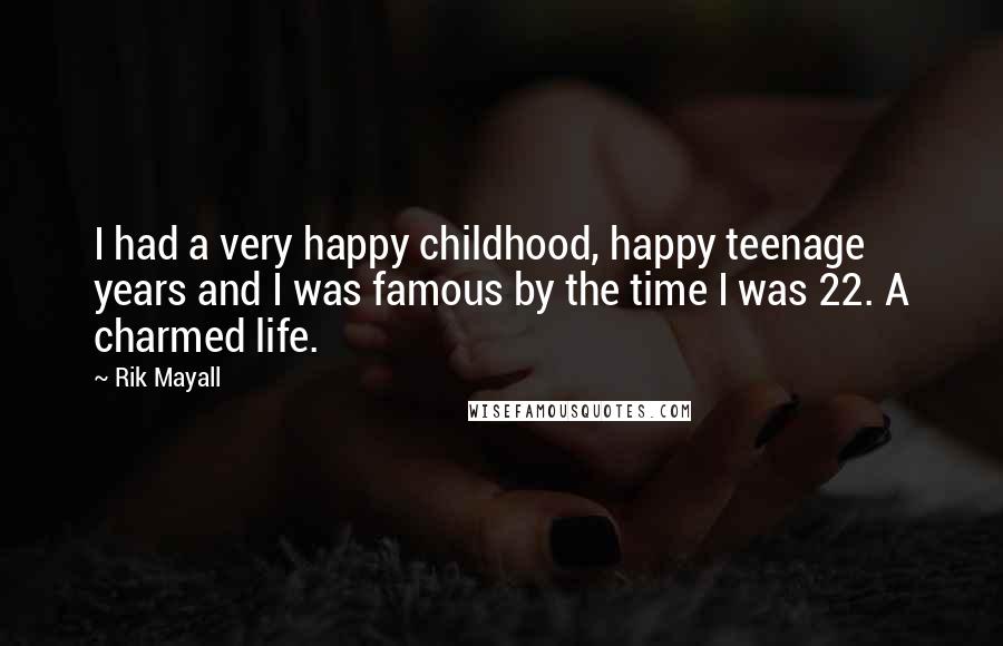 Rik Mayall Quotes: I had a very happy childhood, happy teenage years and I was famous by the time I was 22. A charmed life.