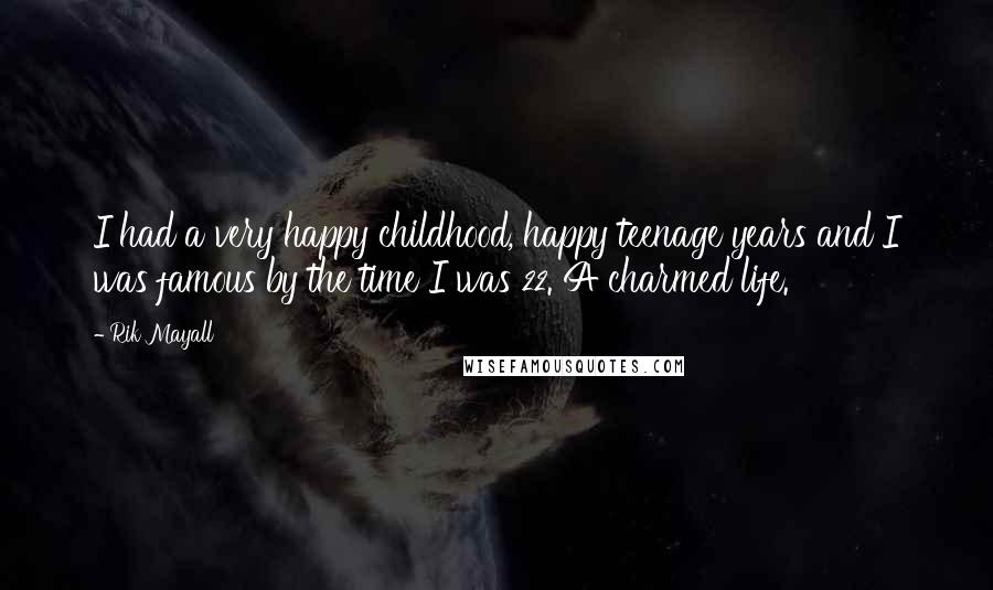 Rik Mayall Quotes: I had a very happy childhood, happy teenage years and I was famous by the time I was 22. A charmed life.
