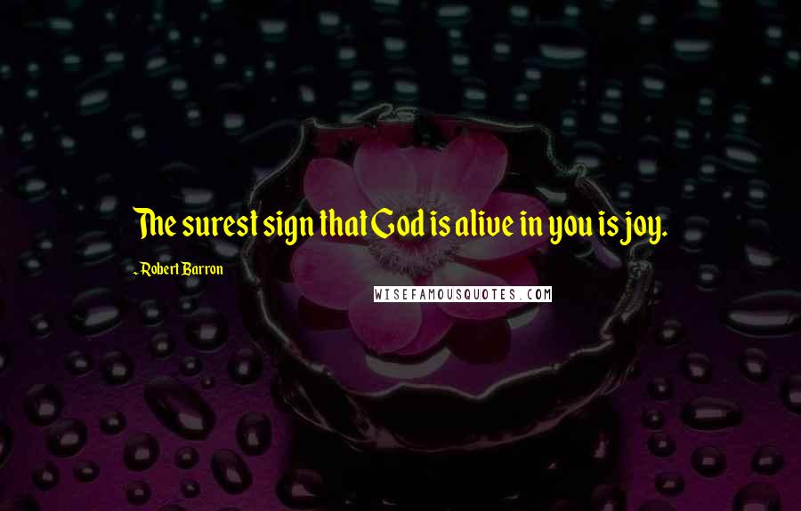 Robert Barron Quotes: The surest sign that God is alive in you is joy.