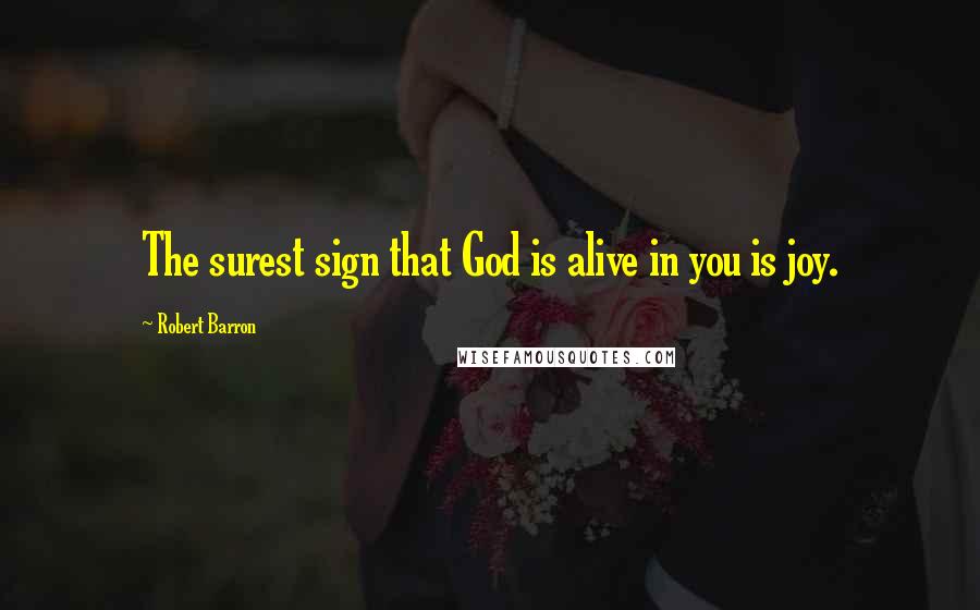 Robert Barron Quotes: The surest sign that God is alive in you is joy.