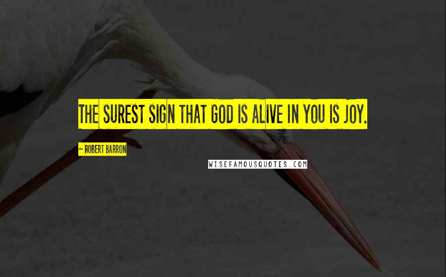 Robert Barron Quotes: The surest sign that God is alive in you is joy.