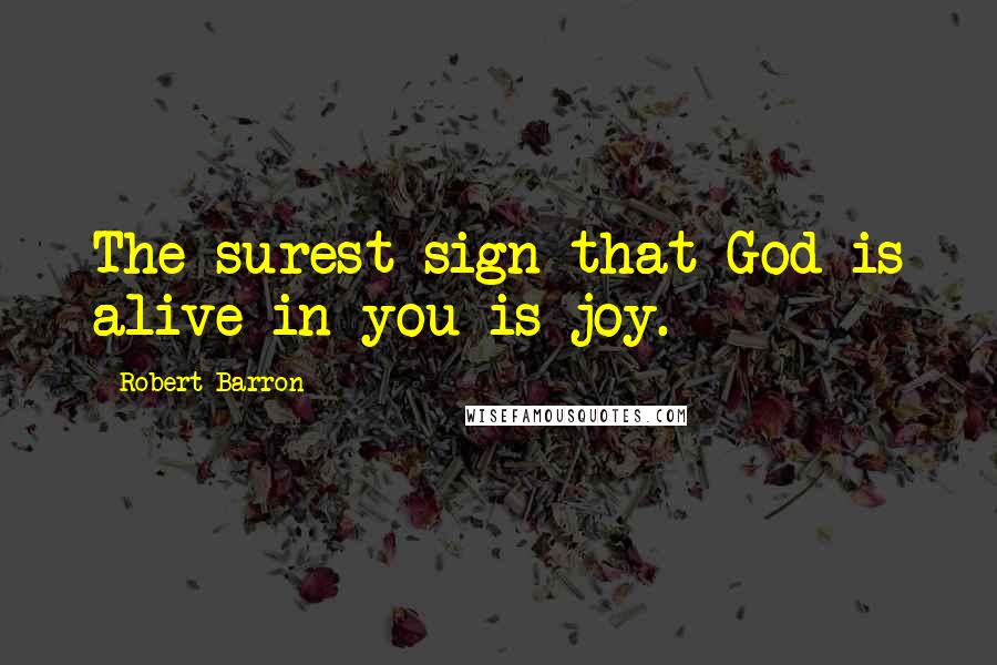 Robert Barron Quotes: The surest sign that God is alive in you is joy.