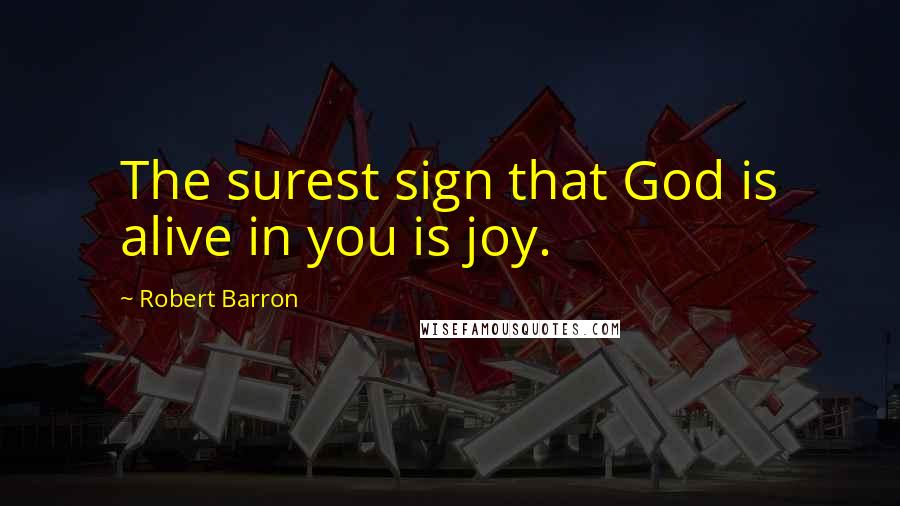 Robert Barron Quotes: The surest sign that God is alive in you is joy.