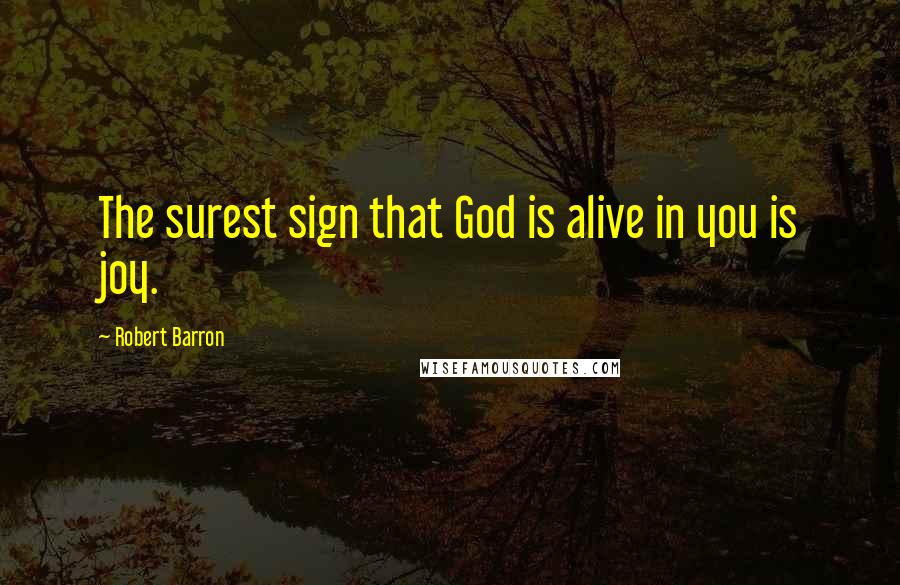 Robert Barron Quotes: The surest sign that God is alive in you is joy.