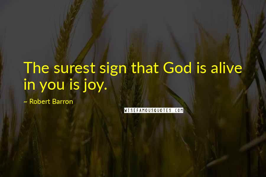 Robert Barron Quotes: The surest sign that God is alive in you is joy.