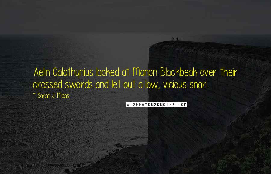 Sarah J. Maas Quotes: Aelin Galathynius looked at Manon Blackbeak over their crossed swords and let out a low, vicious snarl.