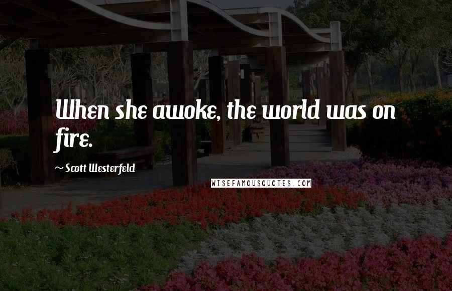 Scott Westerfeld Quotes: When she awoke, the world was on fire.