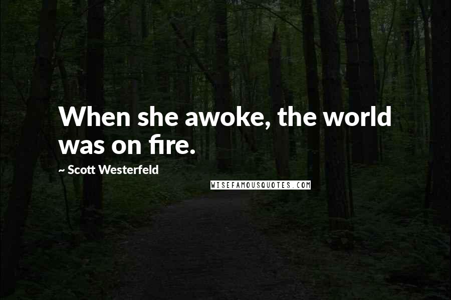 Scott Westerfeld Quotes: When she awoke, the world was on fire.