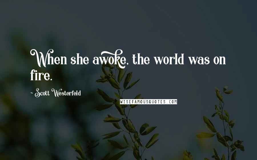 Scott Westerfeld Quotes: When she awoke, the world was on fire.