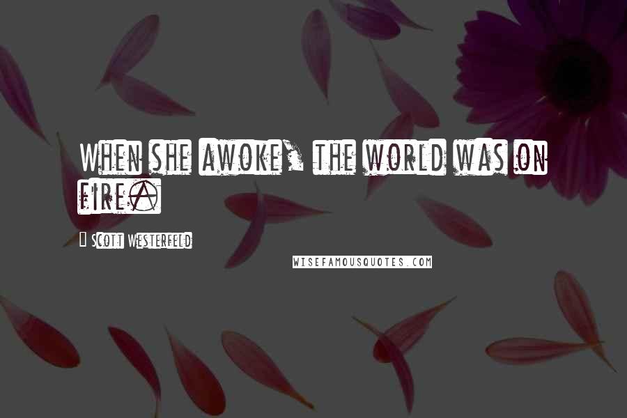Scott Westerfeld Quotes: When she awoke, the world was on fire.