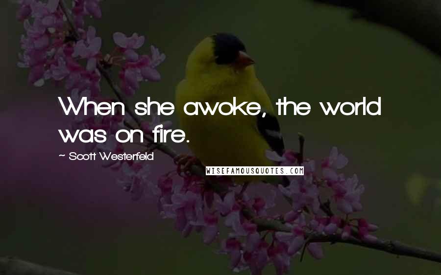 Scott Westerfeld Quotes: When she awoke, the world was on fire.