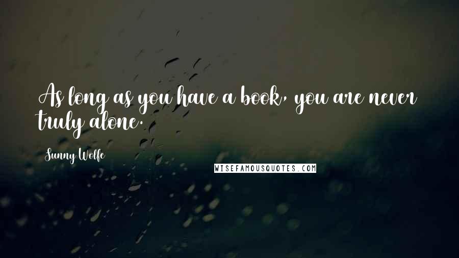 Sunny Wolfe Quotes: As long as you have a book, you are never truly alone.