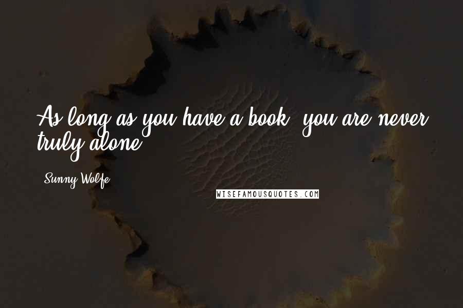 Sunny Wolfe Quotes: As long as you have a book, you are never truly alone.