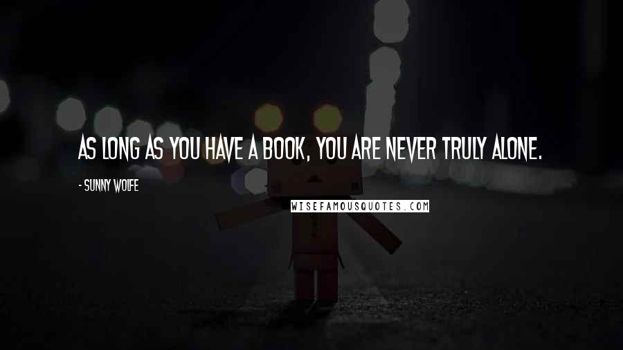 Sunny Wolfe Quotes: As long as you have a book, you are never truly alone.