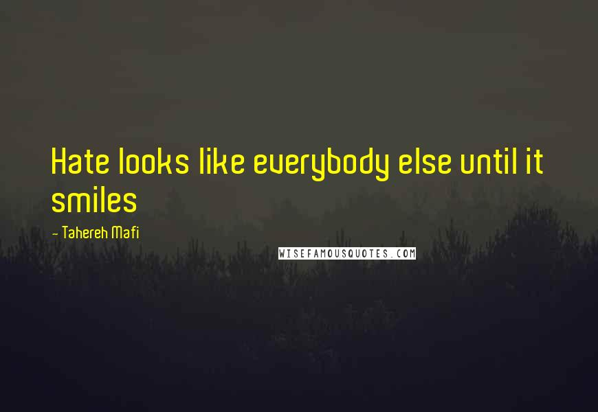 Tahereh Mafi Quotes: Hate looks like everybody else until it smiles