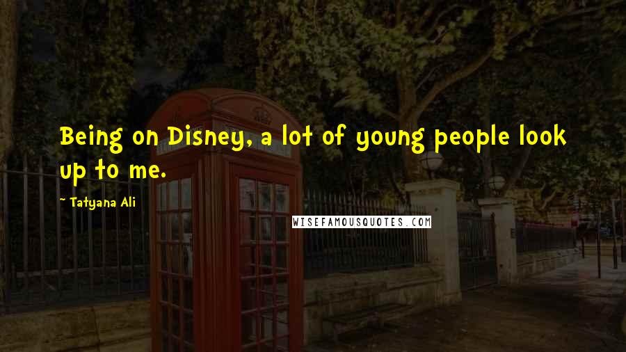 Tatyana Ali Quotes: Being on Disney, a lot of young people look up to me.