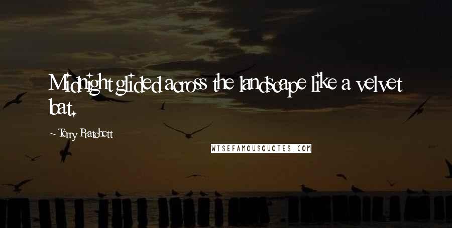 Terry Pratchett Quotes: Midnight glided across the landscape like a velvet bat.