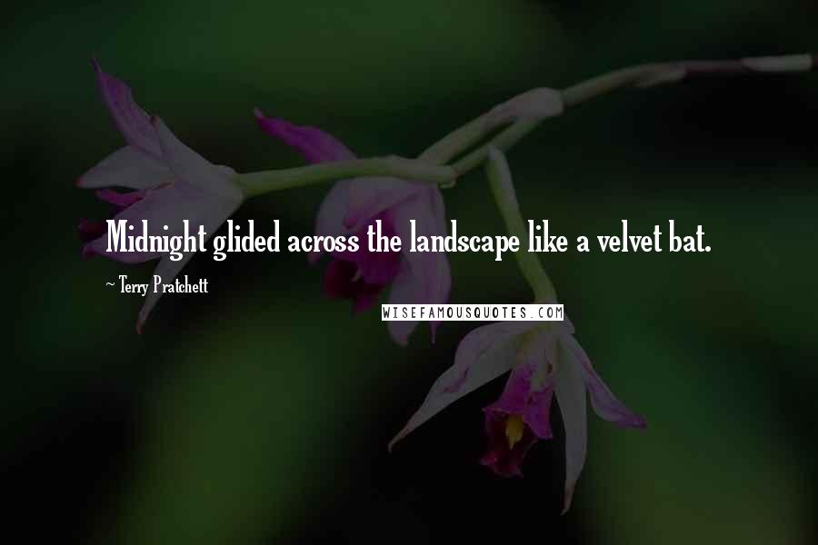 Terry Pratchett Quotes: Midnight glided across the landscape like a velvet bat.