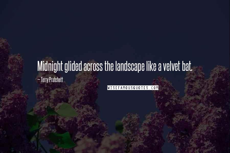 Terry Pratchett Quotes: Midnight glided across the landscape like a velvet bat.