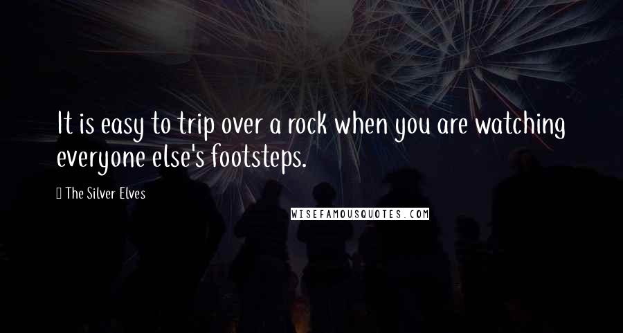 The Silver Elves Quotes: It is easy to trip over a rock when you are watching everyone else's footsteps.