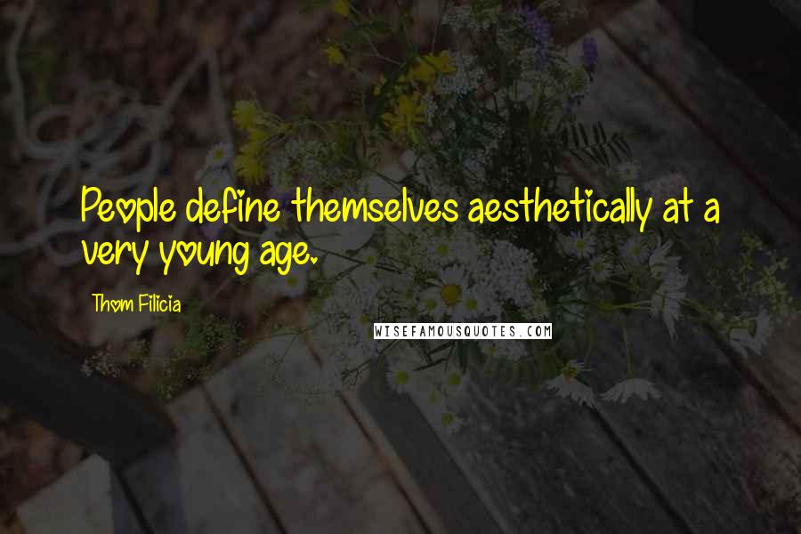 Thom Filicia Quotes: People define themselves aesthetically at a very young age.