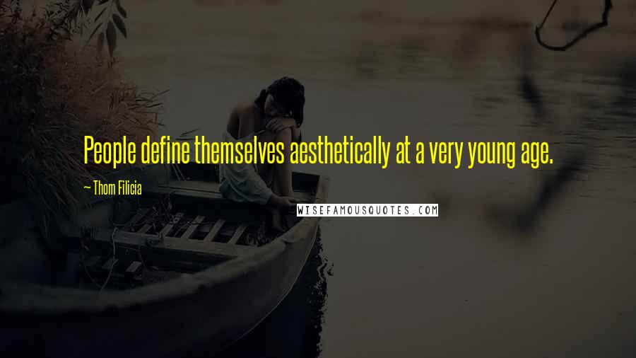 Thom Filicia Quotes: People define themselves aesthetically at a very young age.