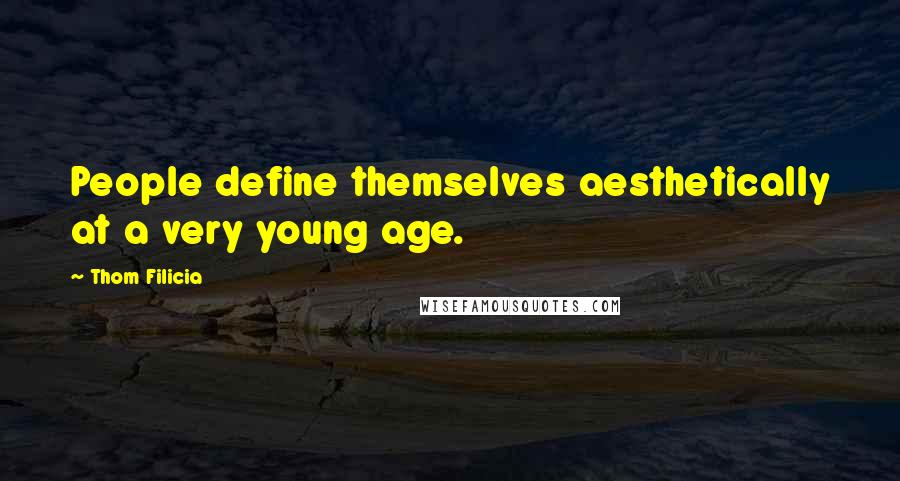 Thom Filicia Quotes: People define themselves aesthetically at a very young age.