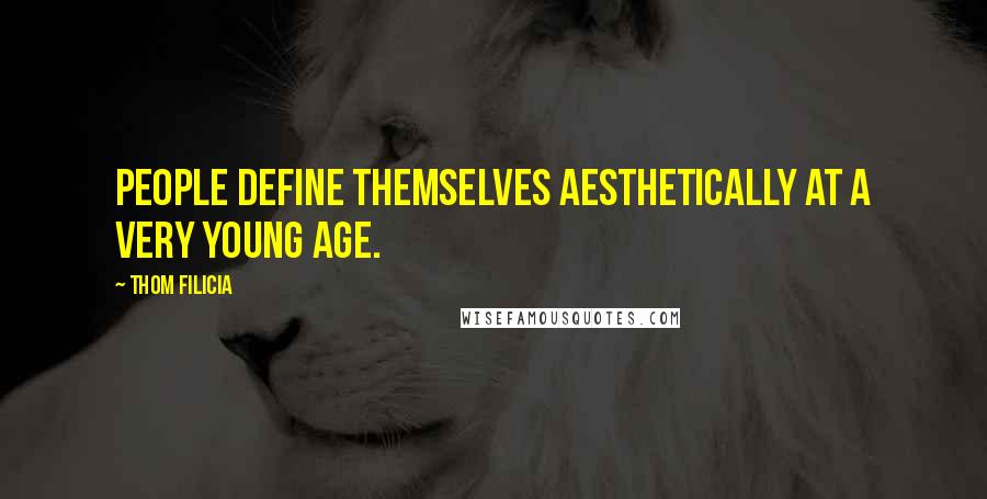 Thom Filicia Quotes: People define themselves aesthetically at a very young age.