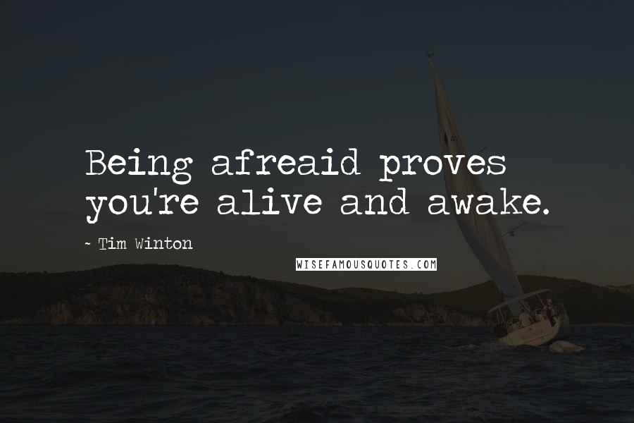 Tim Winton Quotes: Being afreaid proves you're alive and awake.