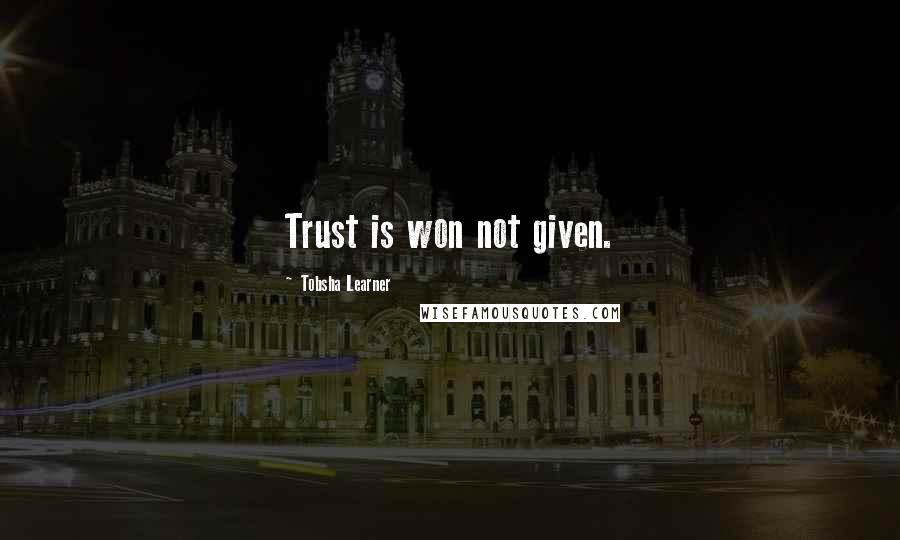 Tobsha Learner Quotes: Trust is won not given.