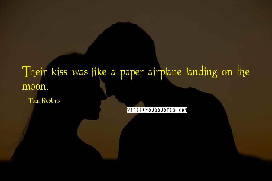 Tom Robbins Quotes: Their kiss was like a paper airplane landing on the moon.