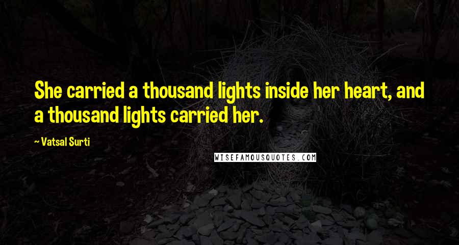 Vatsal Surti Quotes: She carried a thousand lights inside her heart, and a thousand lights carried her.