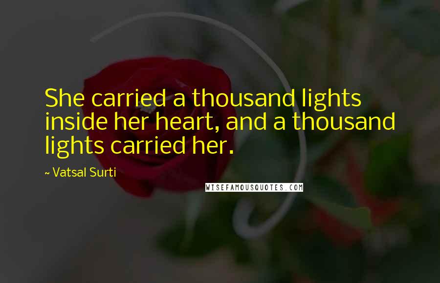 Vatsal Surti Quotes: She carried a thousand lights inside her heart, and a thousand lights carried her.