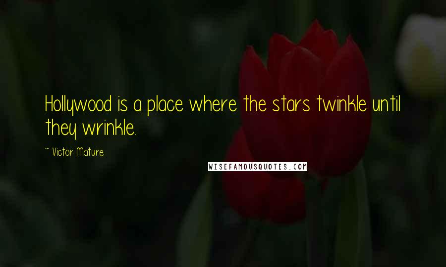 Victor Mature Quotes: Hollywood is a place where the stars twinkle until they wrinkle.