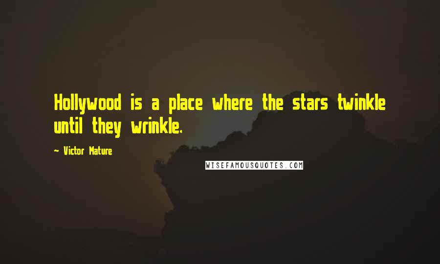 Victor Mature Quotes: Hollywood is a place where the stars twinkle until they wrinkle.