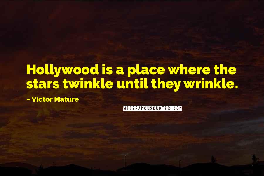 Victor Mature Quotes: Hollywood is a place where the stars twinkle until they wrinkle.