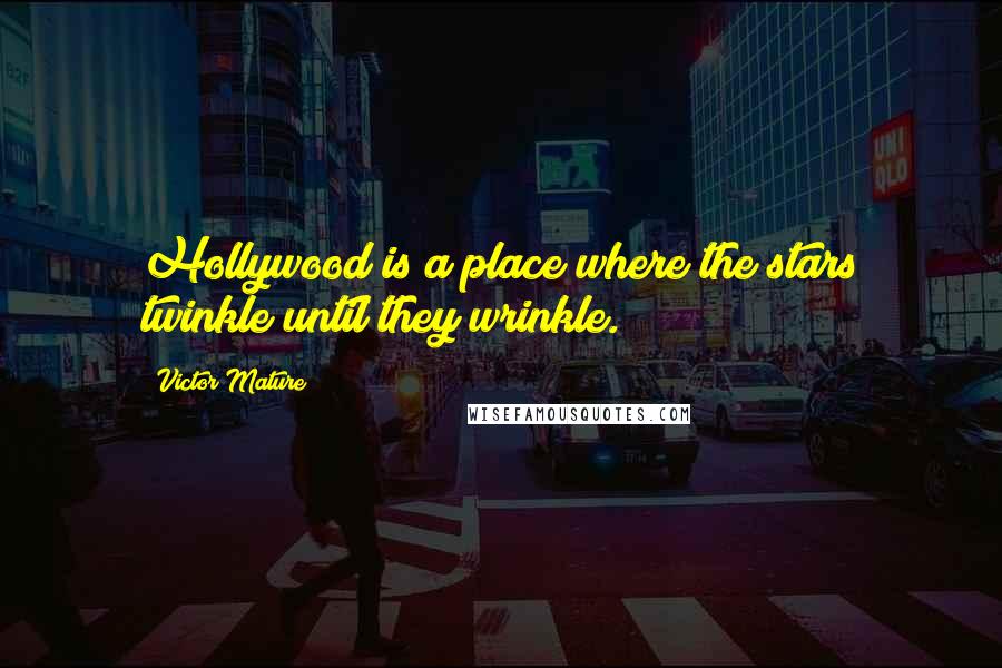 Victor Mature Quotes: Hollywood is a place where the stars twinkle until they wrinkle.