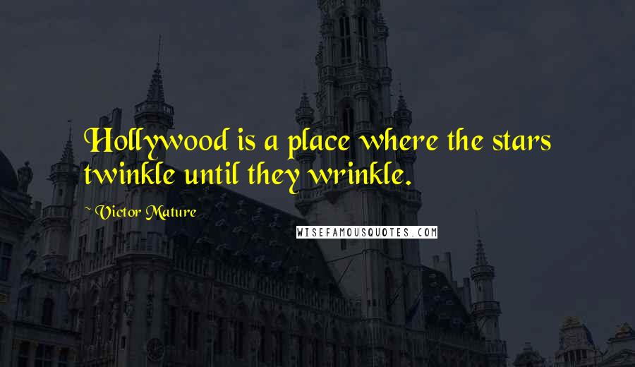 Victor Mature Quotes: Hollywood is a place where the stars twinkle until they wrinkle.