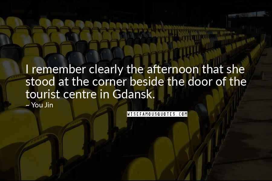 You Jin Quotes: I remember clearly the afternoon that she stood at the corner beside the door of the tourist centre in Gdansk.